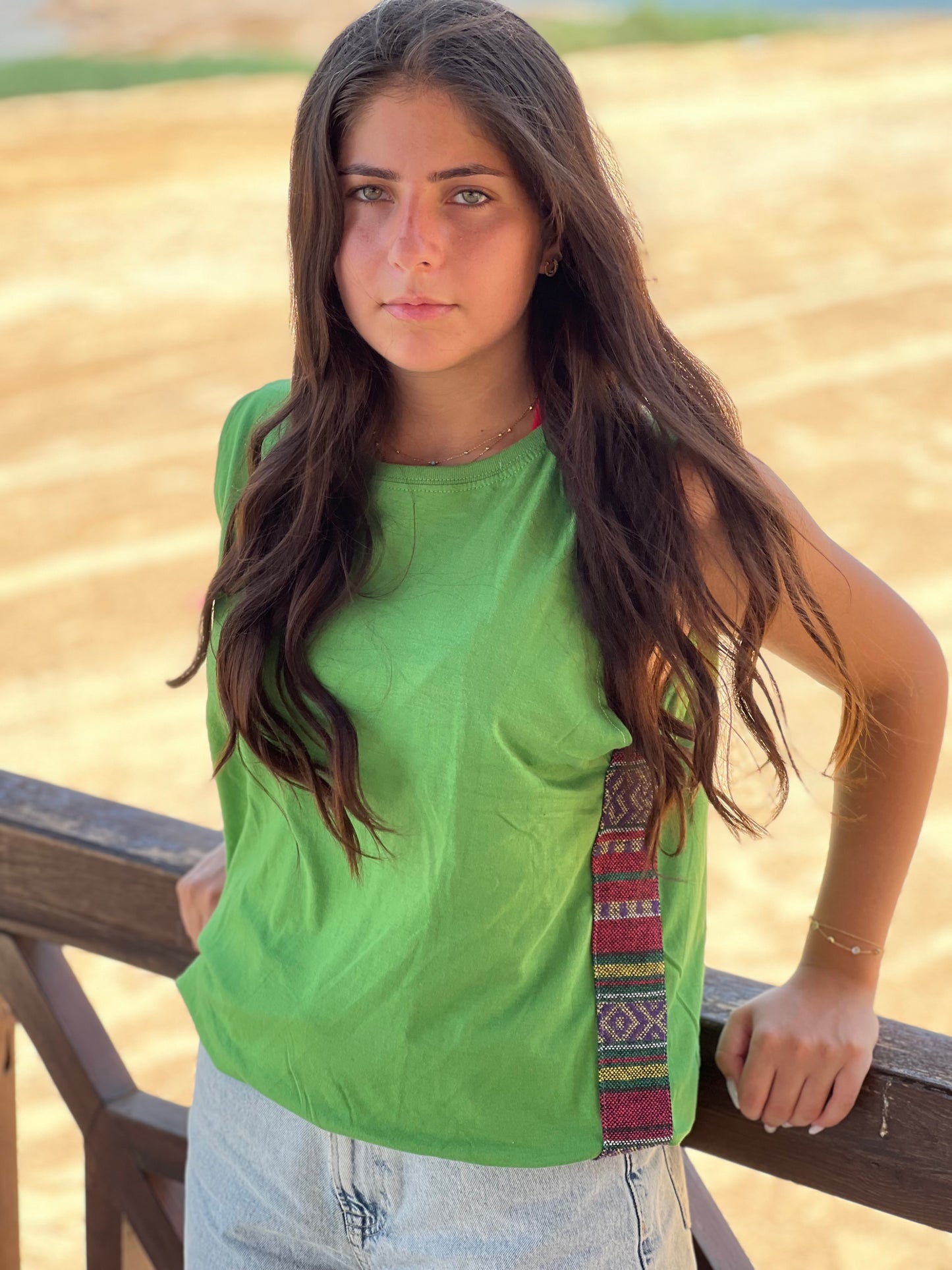 Tout Side-strips on Green sleeveless shirt