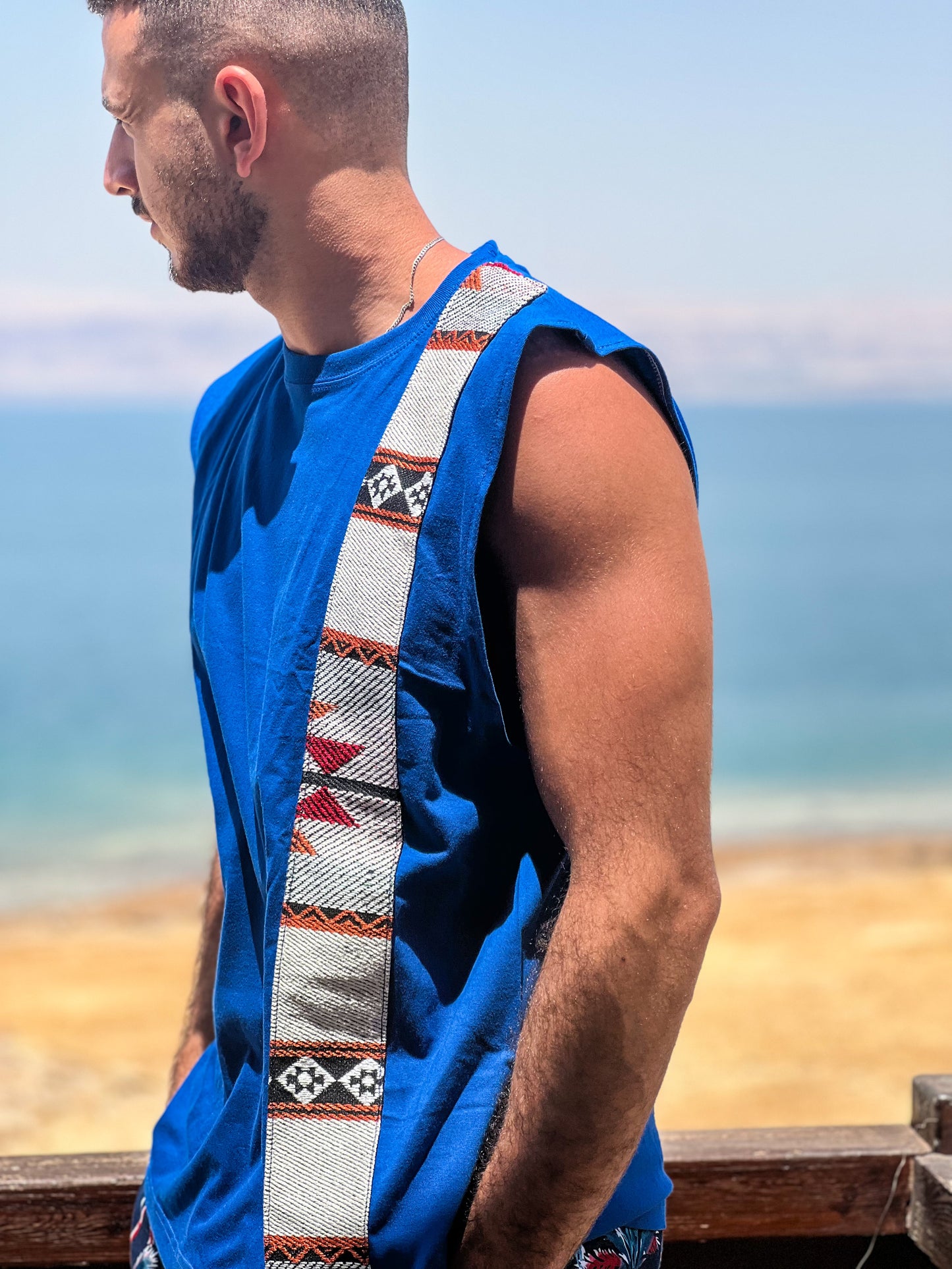 Bassem Front strip on  Blue sleeveless shirt